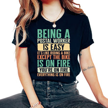Load image into Gallery viewer, Mailman Shirt, Being A Postal Worker Is Easy It's Like Riding A Tee, - Unisex T-Shirt - Black